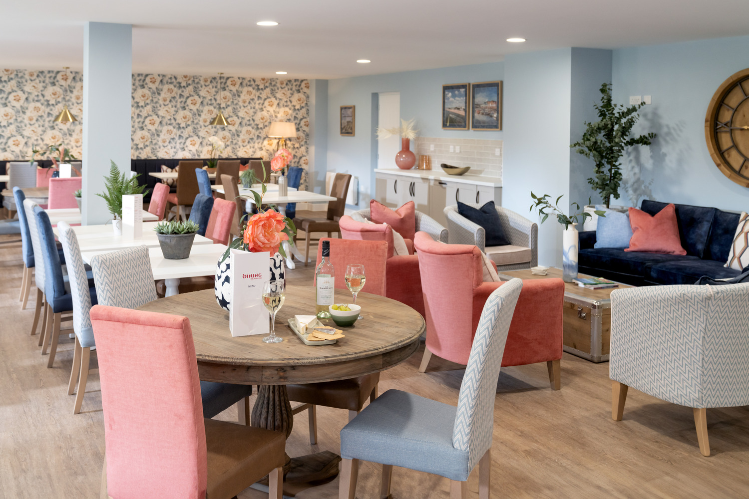 a dining room with a table and chairs