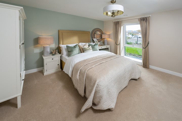 a bedroom with a large bed