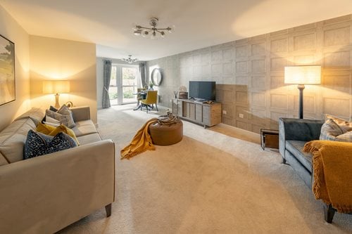 a living room with a couch and a tv