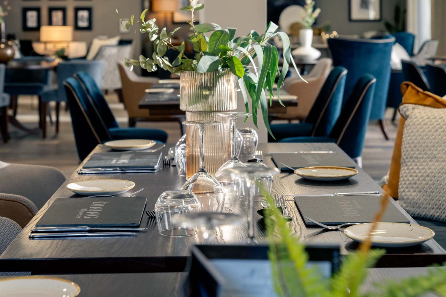 a table with empty glasses