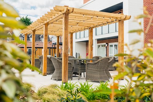 a patio with a covered patio