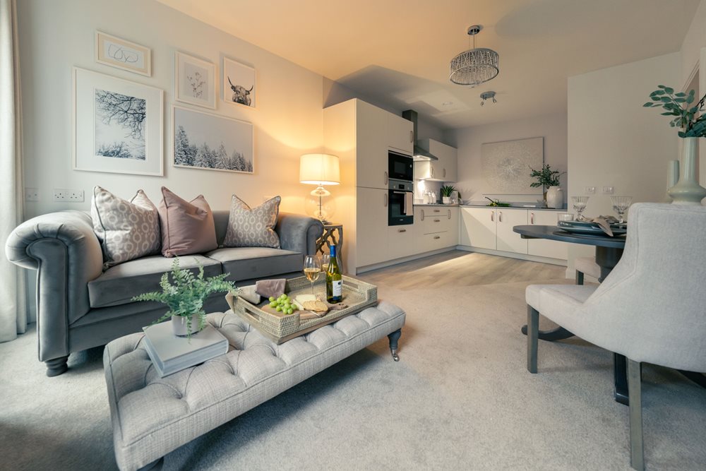 a living room with a couch and a table