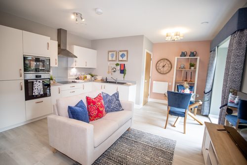 a living room with a couch and a table