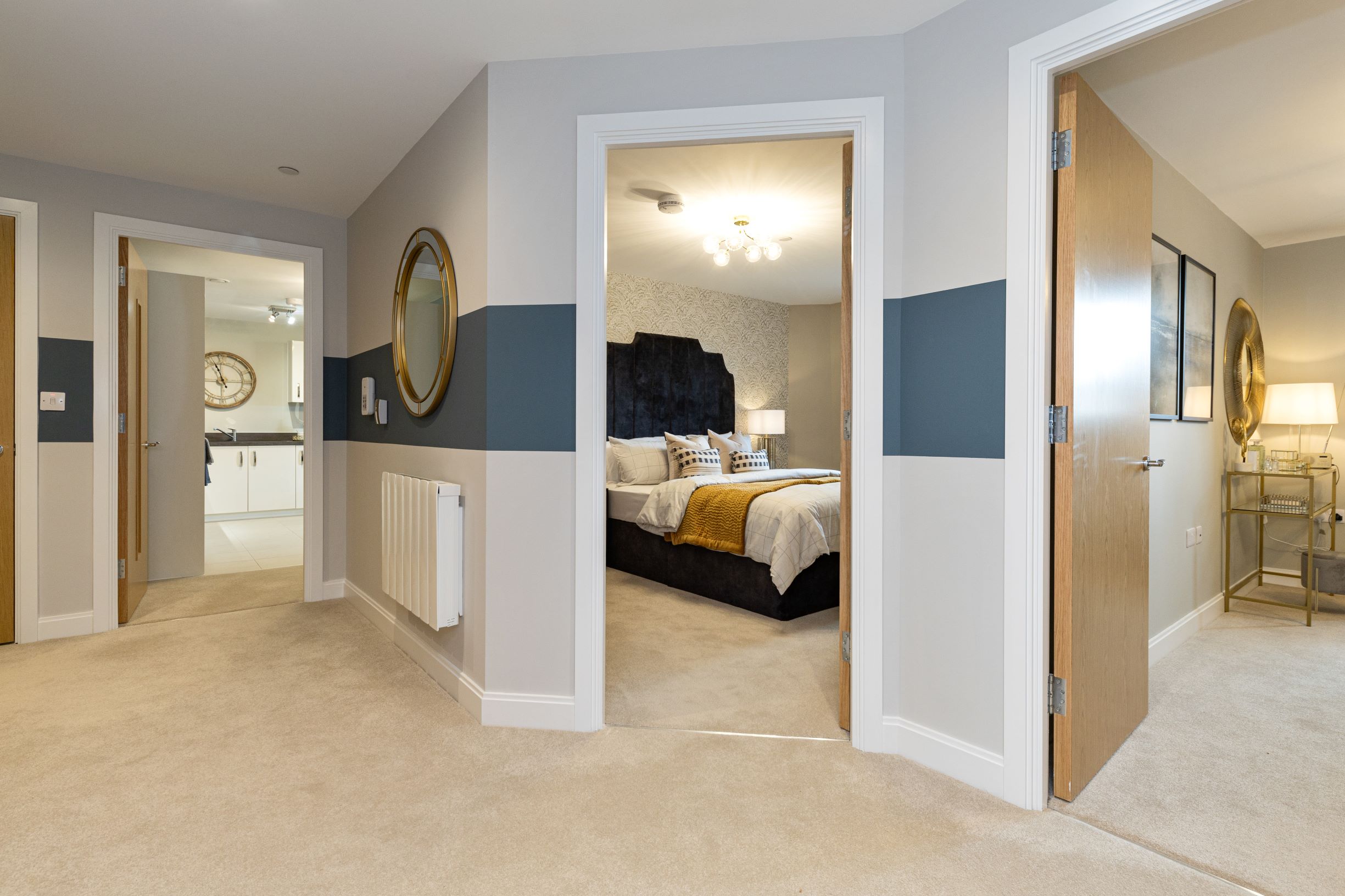 a bedroom with a bed and a mirror