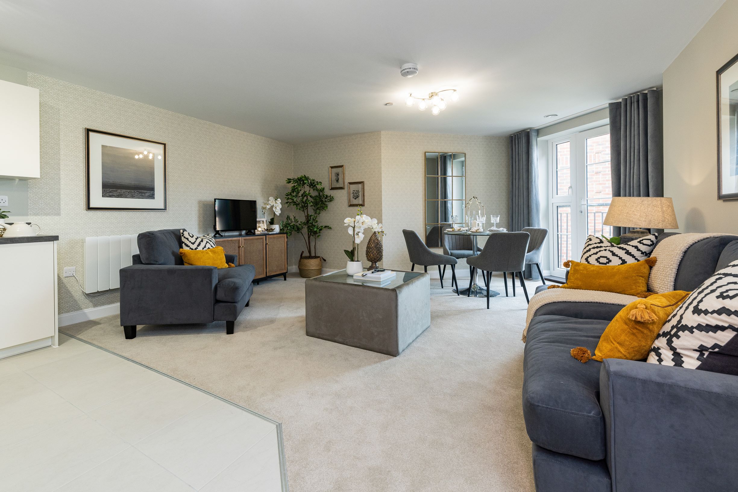 a living room with a couch and a table
