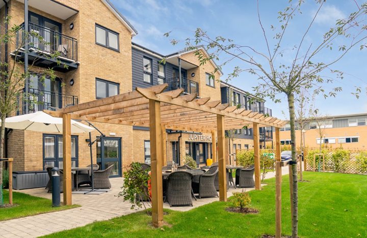 a building with a tree in front