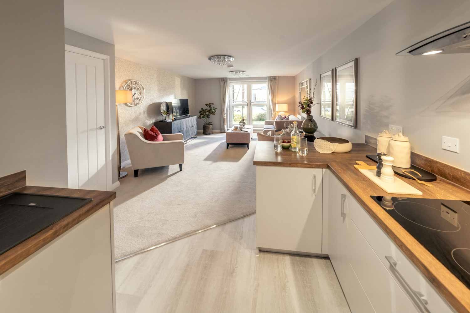 a kitchen with a sink and a couch