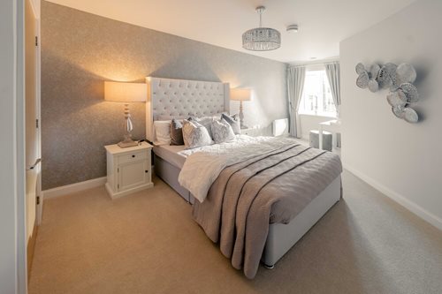 a bedroom with a large bed