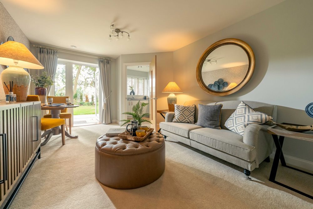 a living room with a large mirror