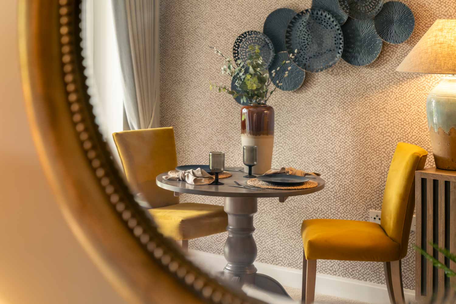 a table with chairs and a coffee table
