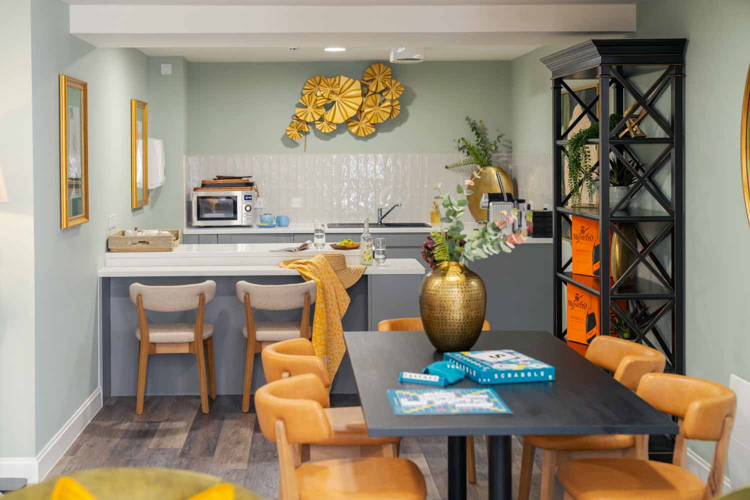 a kitchen with a table and chairs