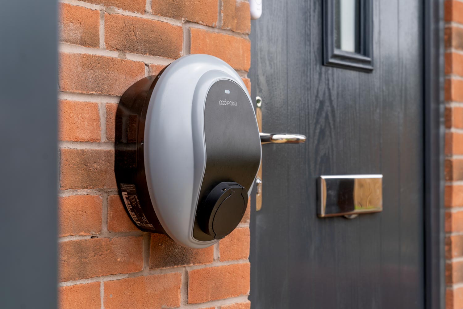 a black door with a metal handle