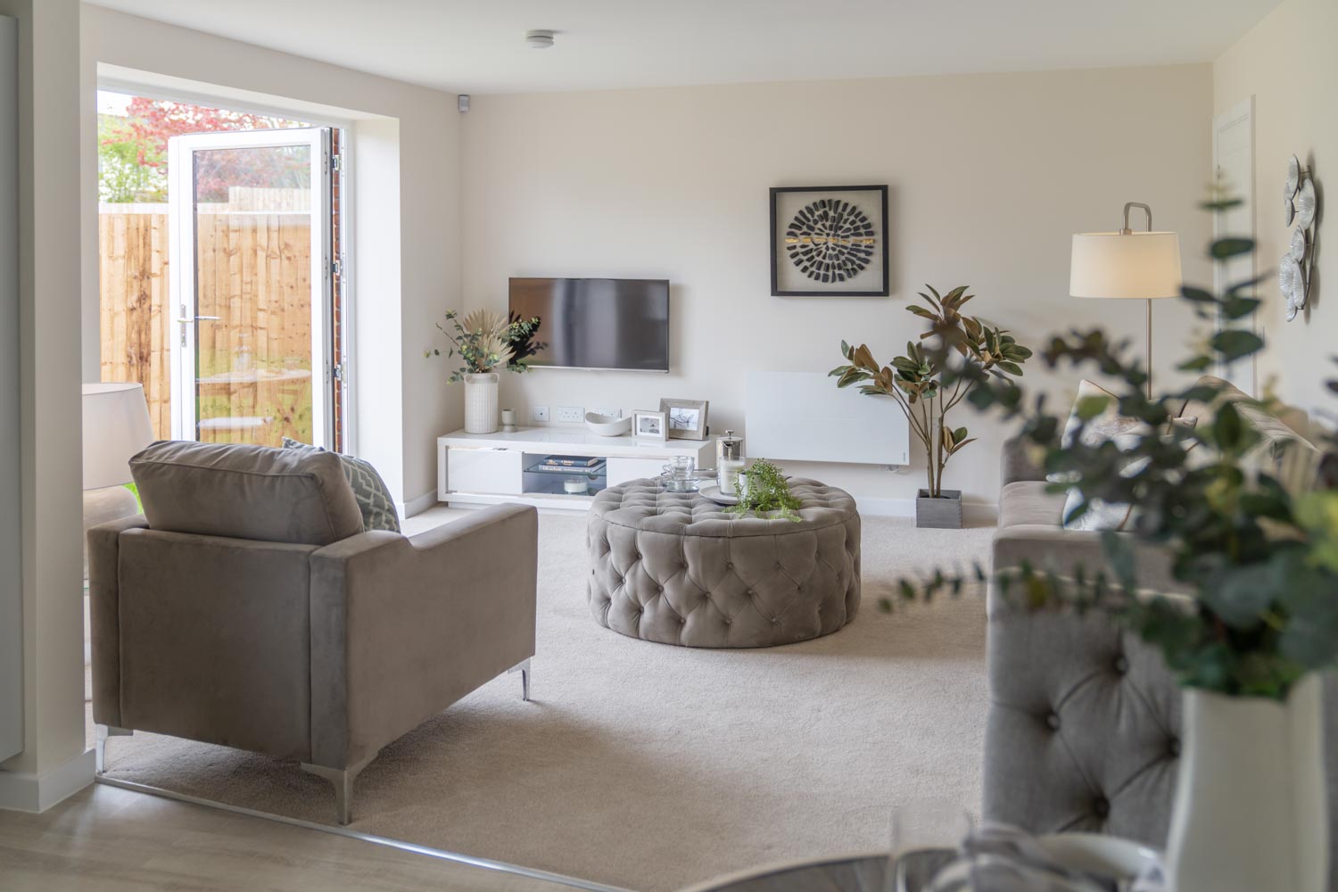 a living room with a couch and a table
