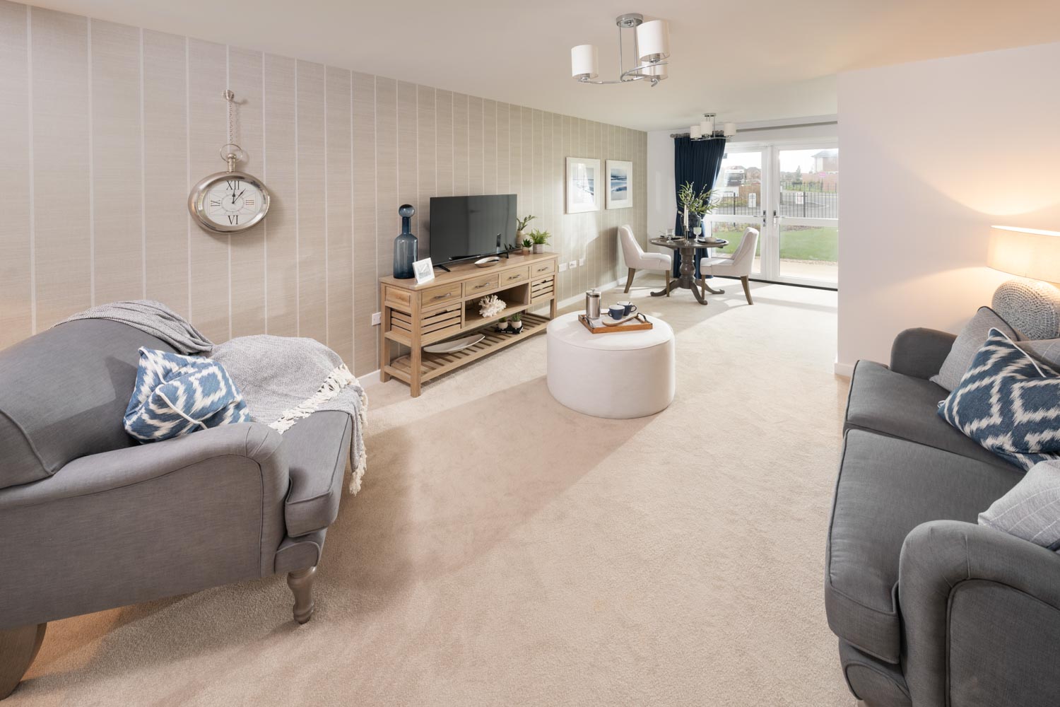 a living room with a couch and a tv