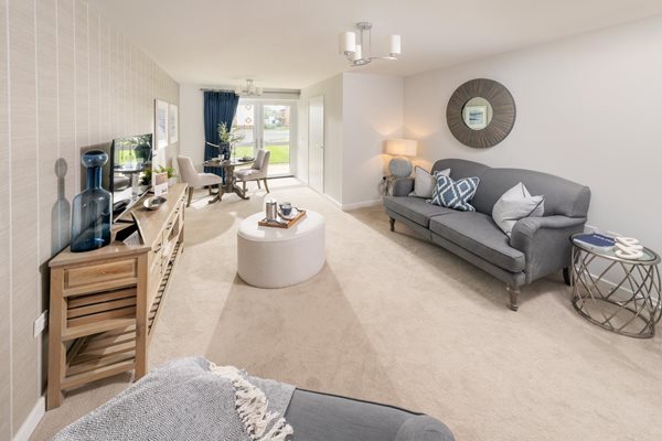 a living room with a couch and a table