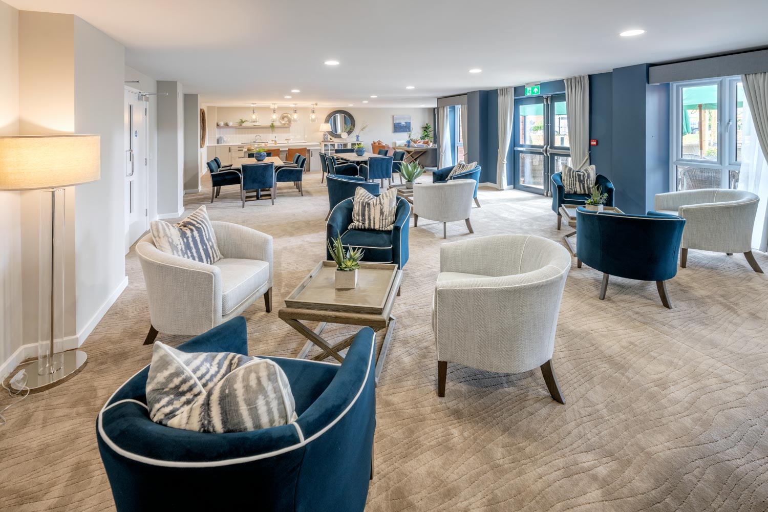 a room with a table chairs and a couch