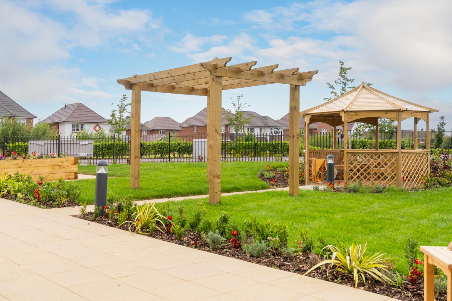 a garden with a gazebo