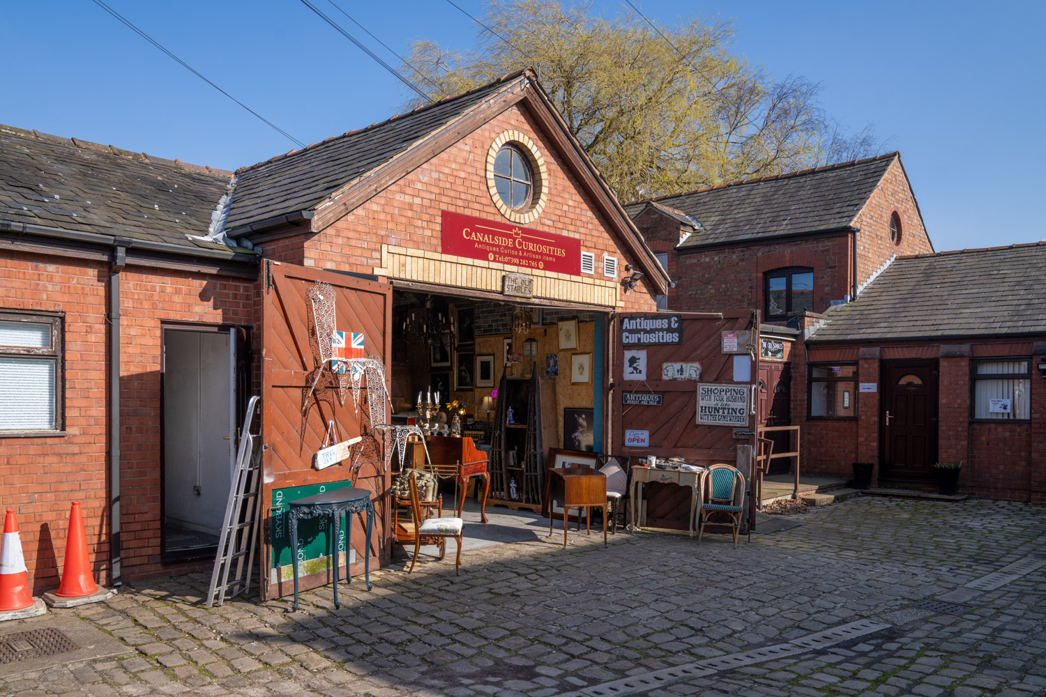 a brick building with a brick road