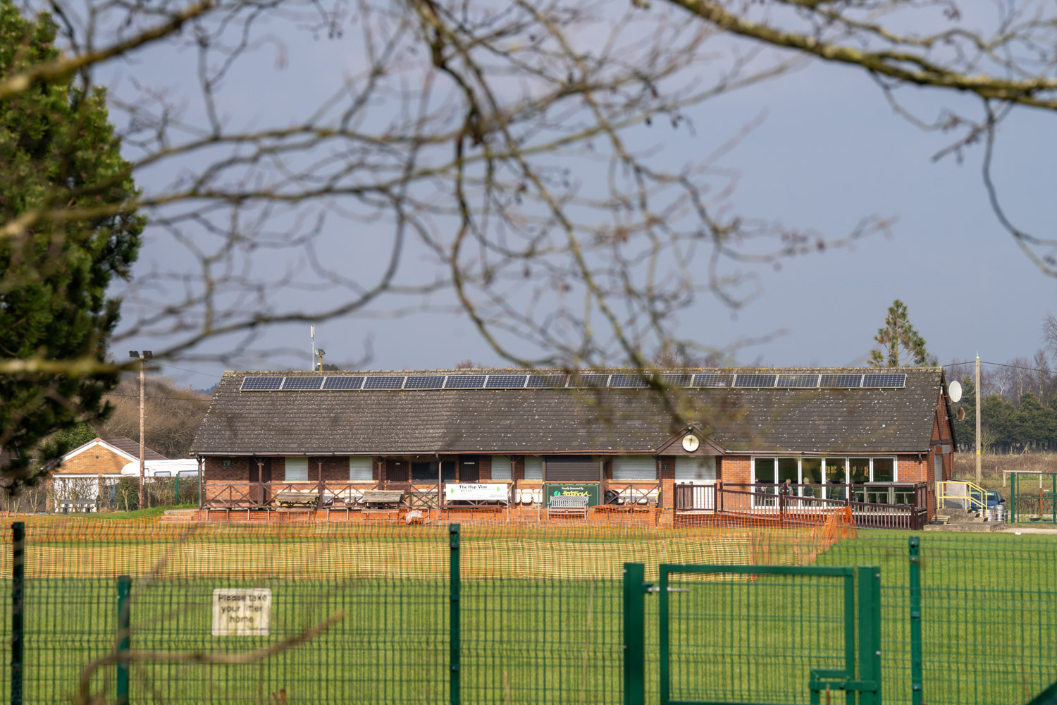 a building behind a fence