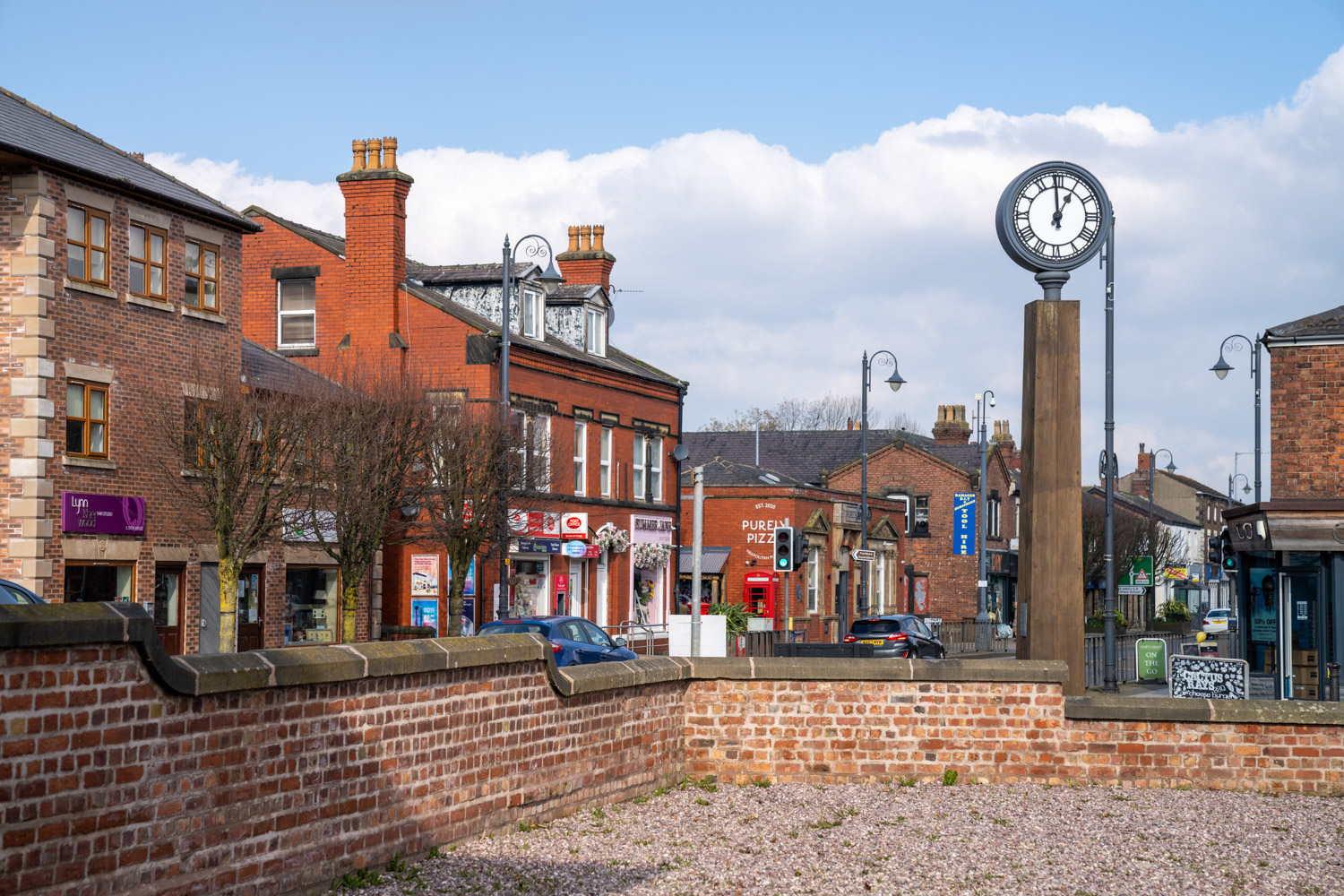 a clock on a pole