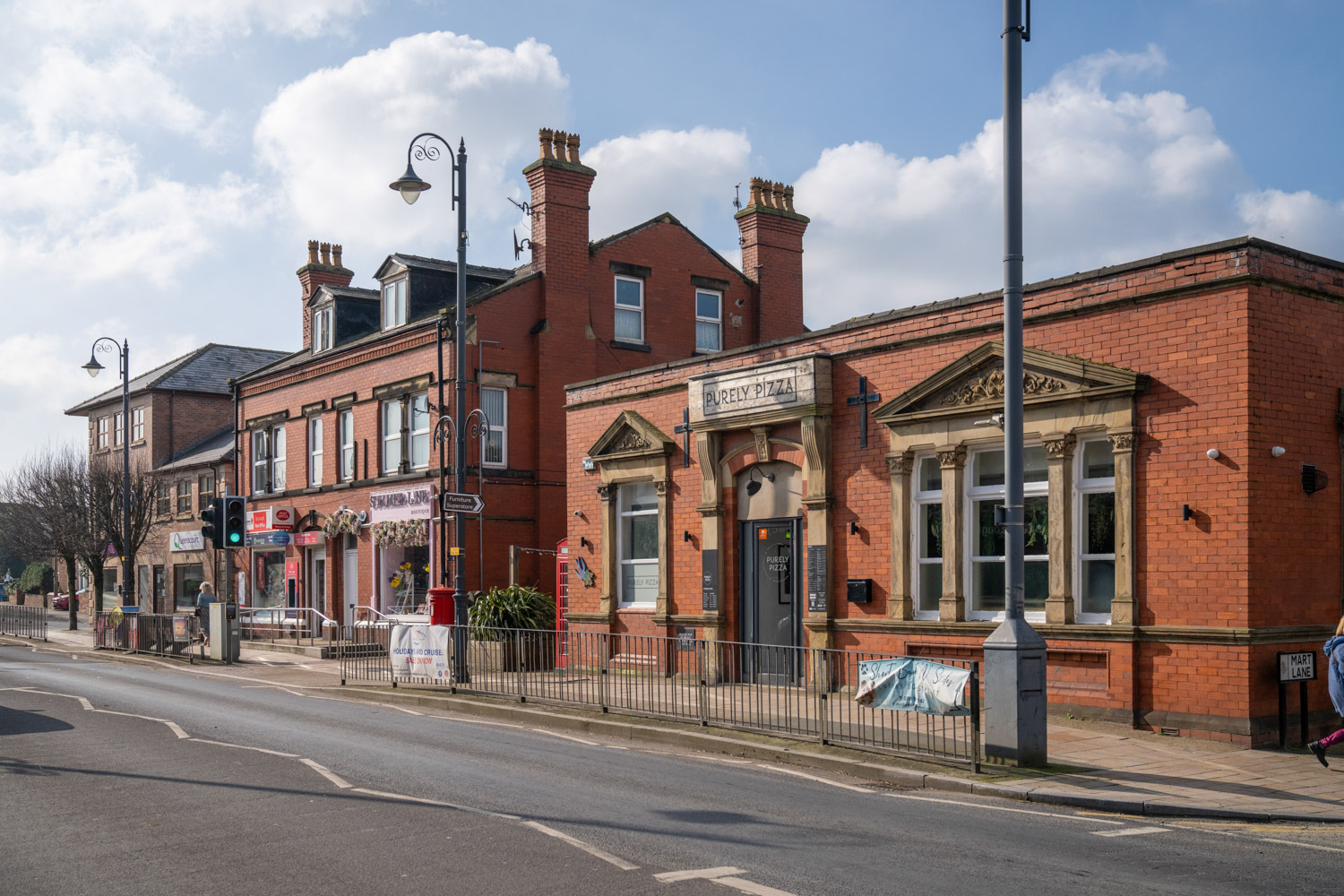 a street with a row of buildings