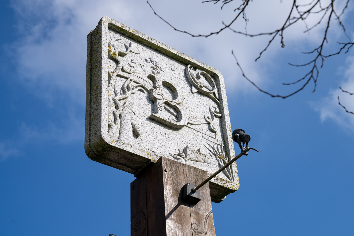 a bird on a sign