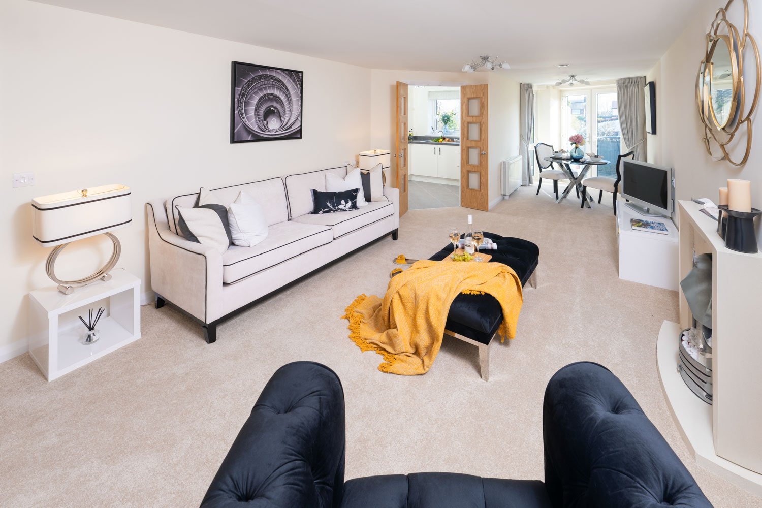a bedroom with a bed and a tv