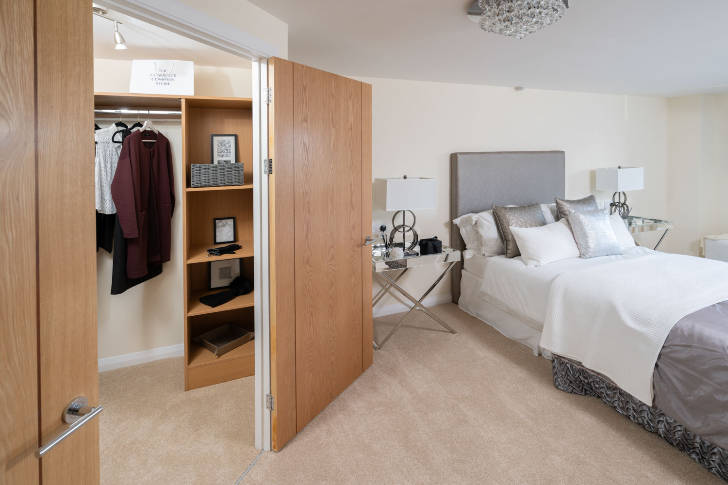 a bedroom with a closet and a bed