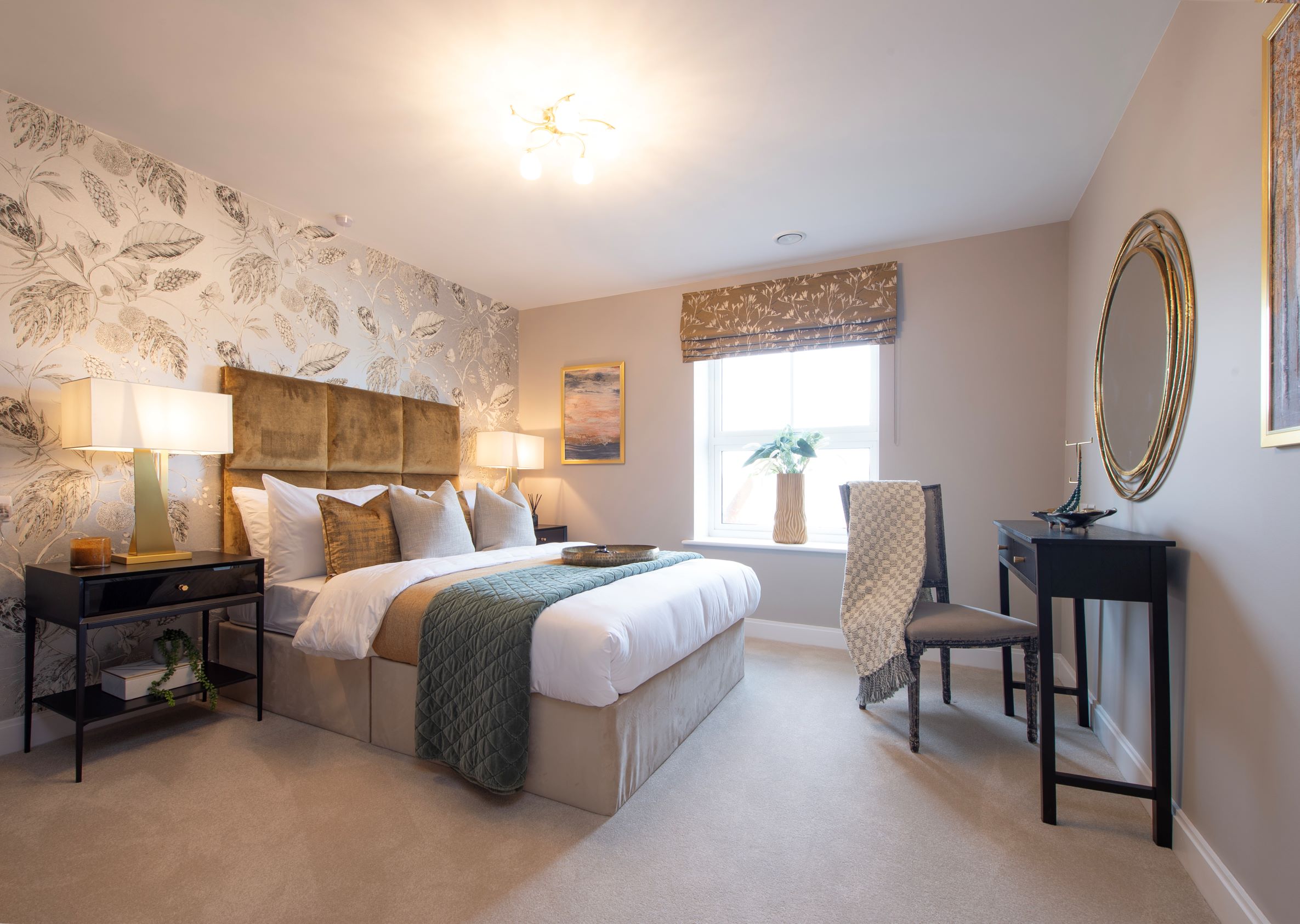 a bedroom with a bed and a chair