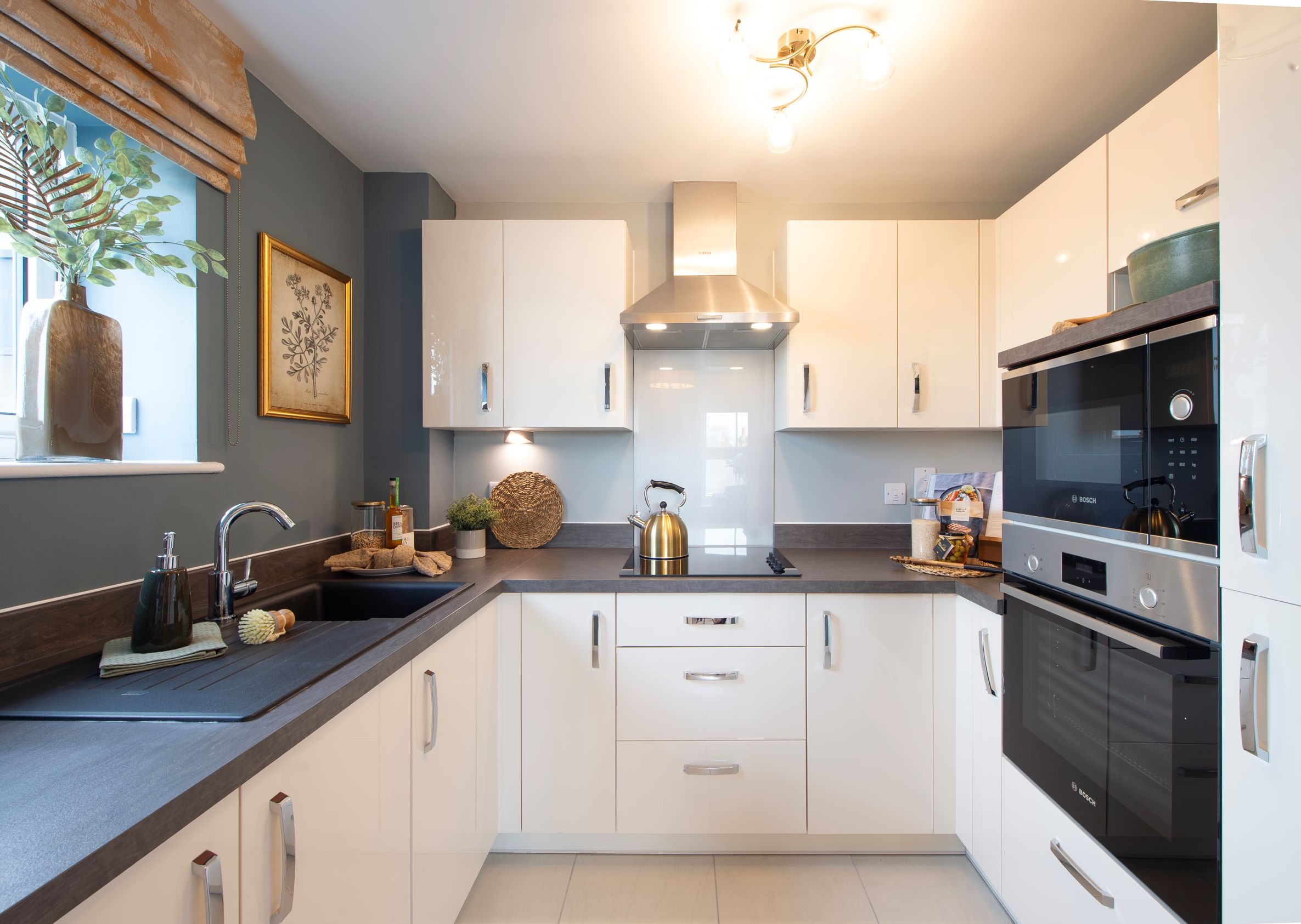 a kitchen with white cabinets