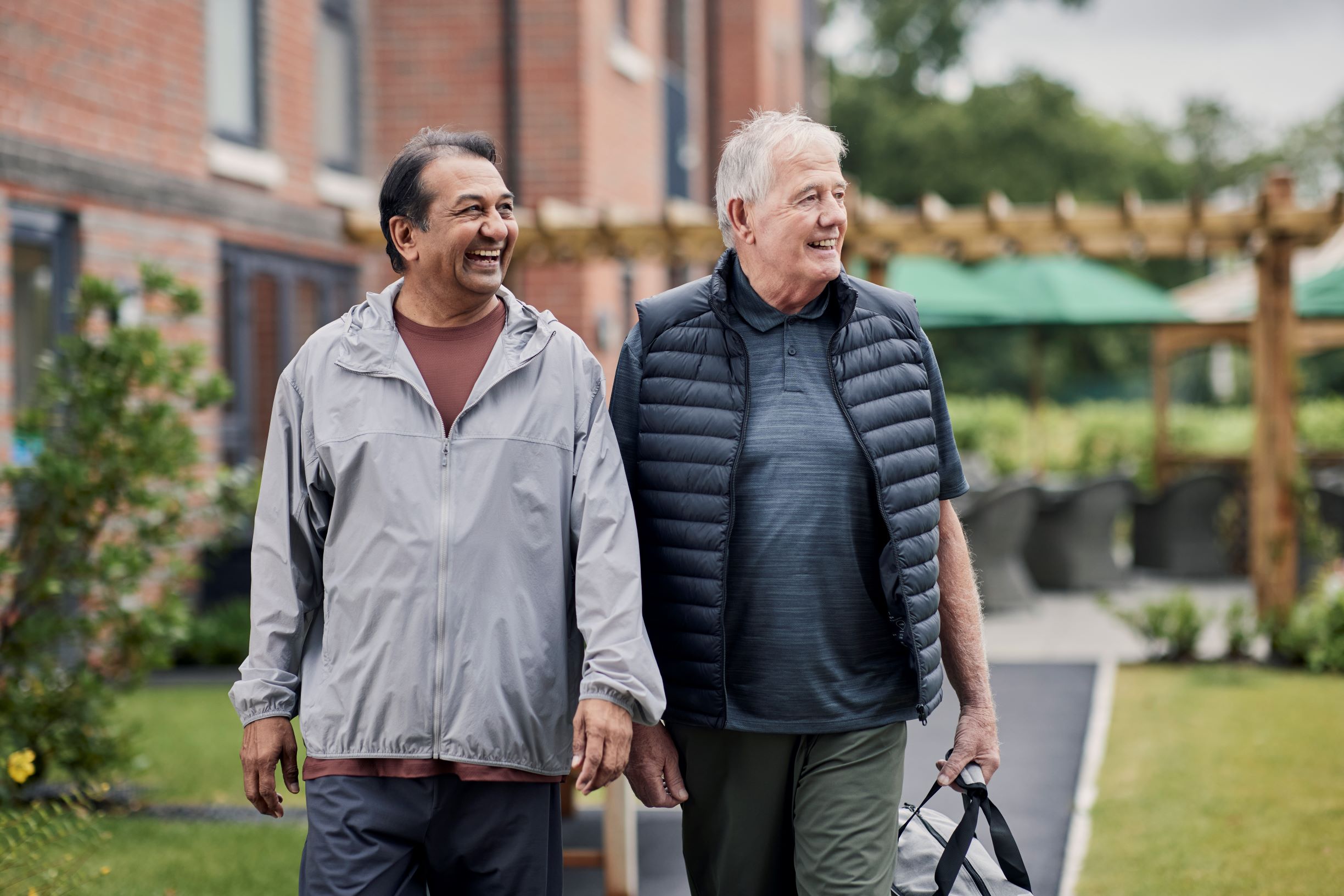 a couple of men walking