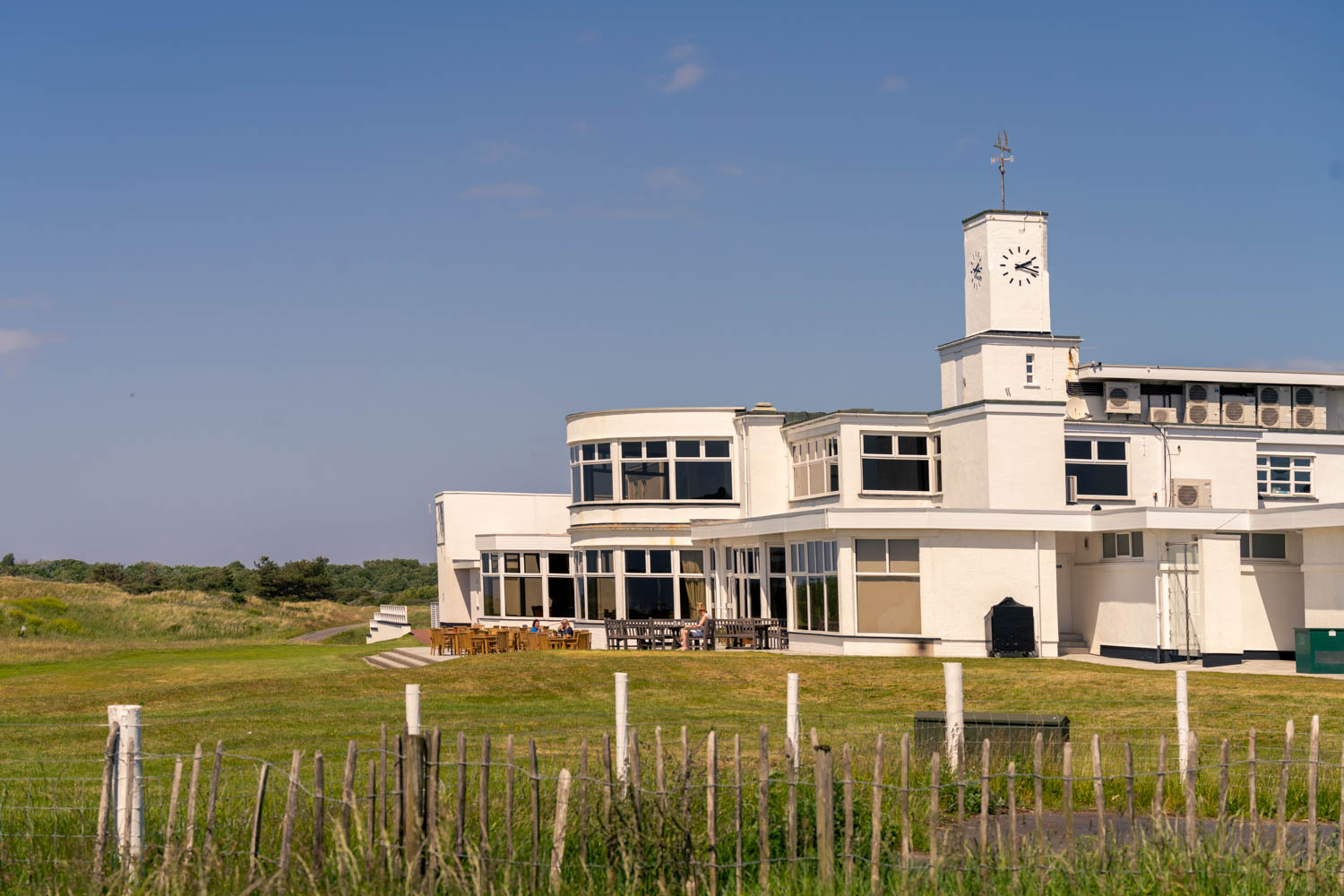 a white building with a tower