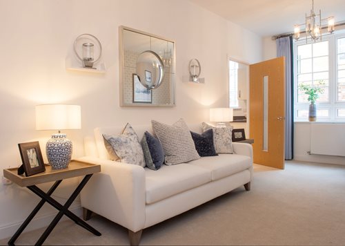 a living room with a white couch