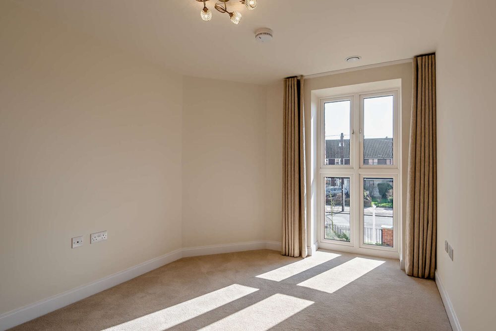 a room with a door and windows