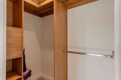 a white refrigerator in a room