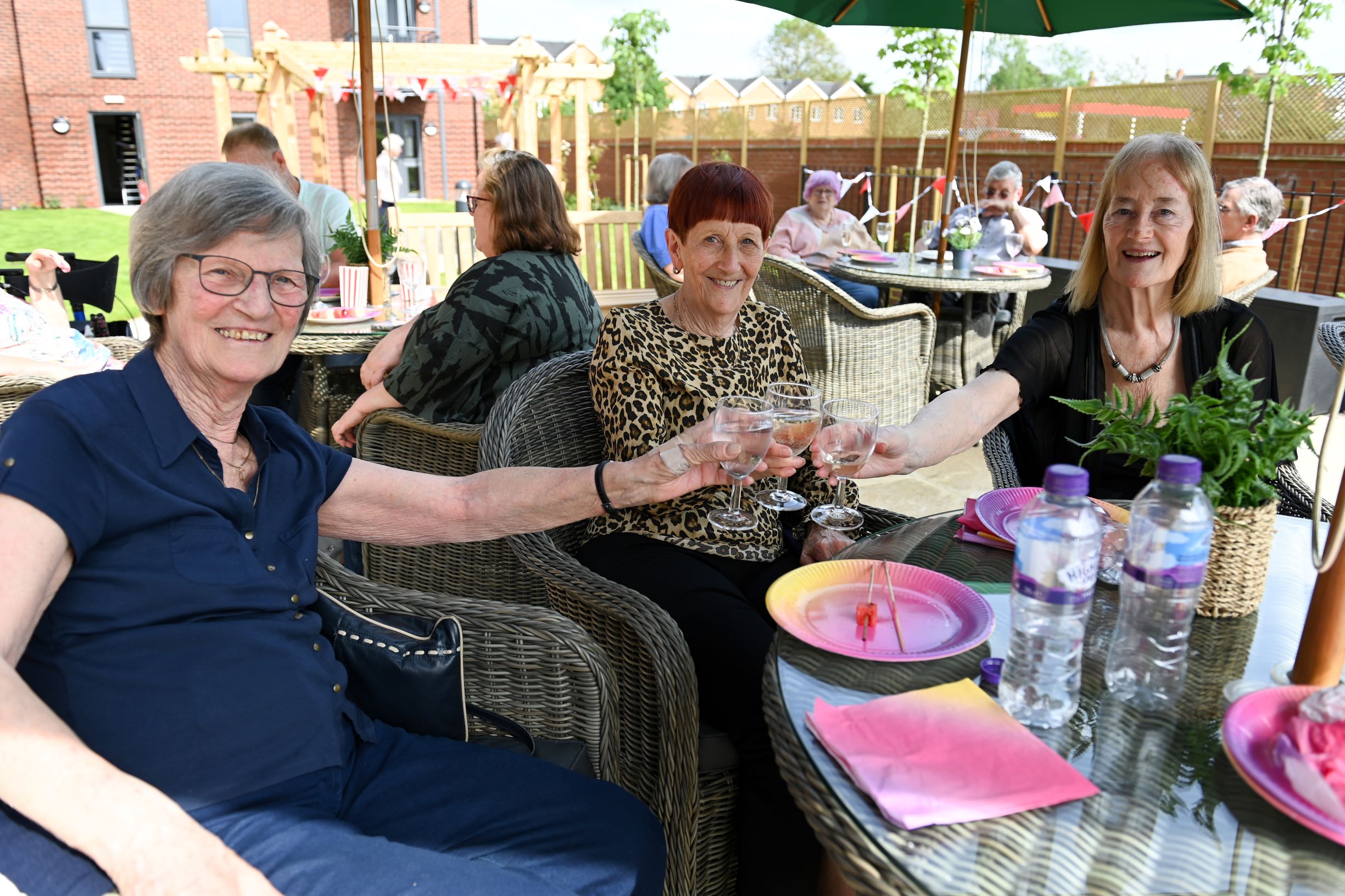 a group of women sitting at a table