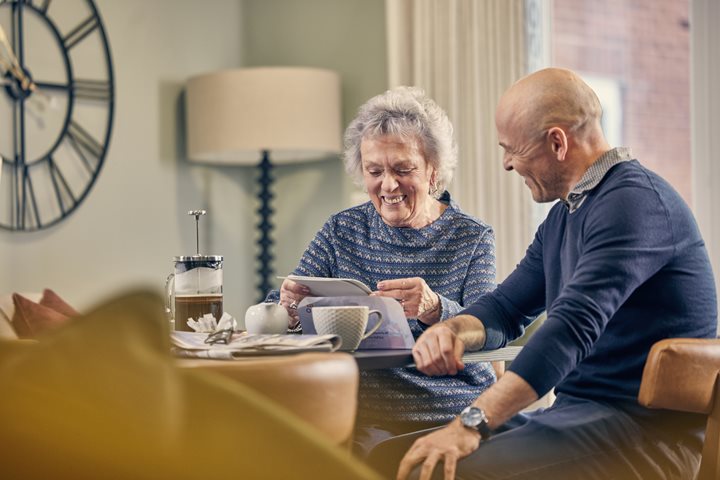 a man and a woman sitting at a table