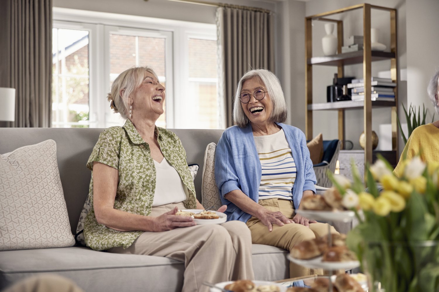 a couple of women laughing