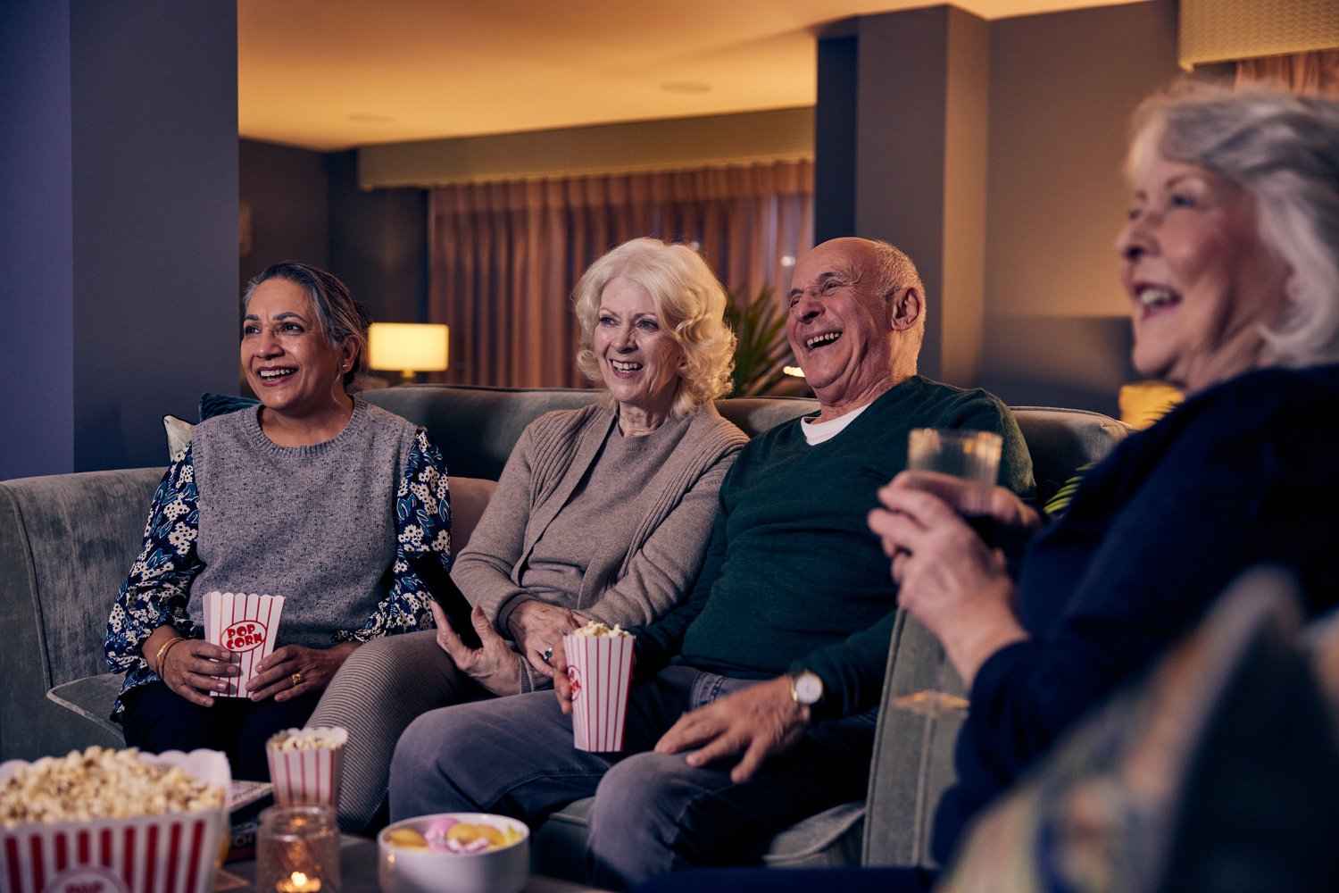 a group of people sitting on a couch