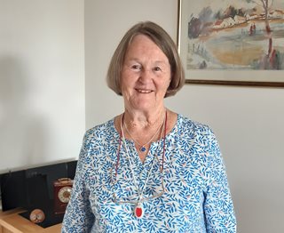 a person smiling for the camera