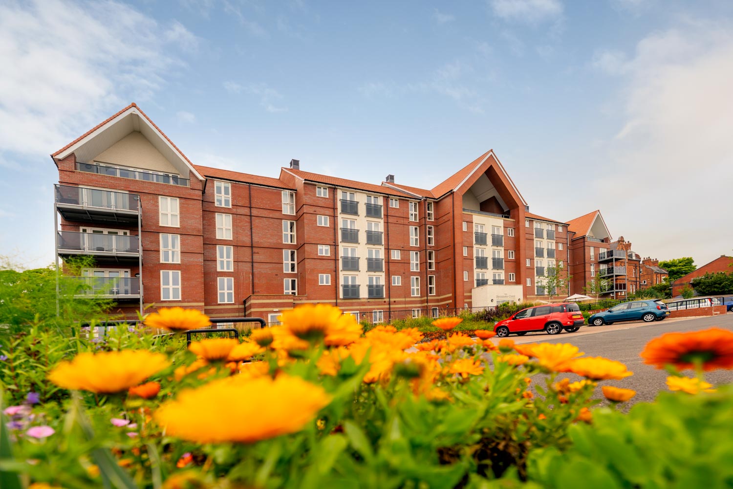 a building with cars parked in front