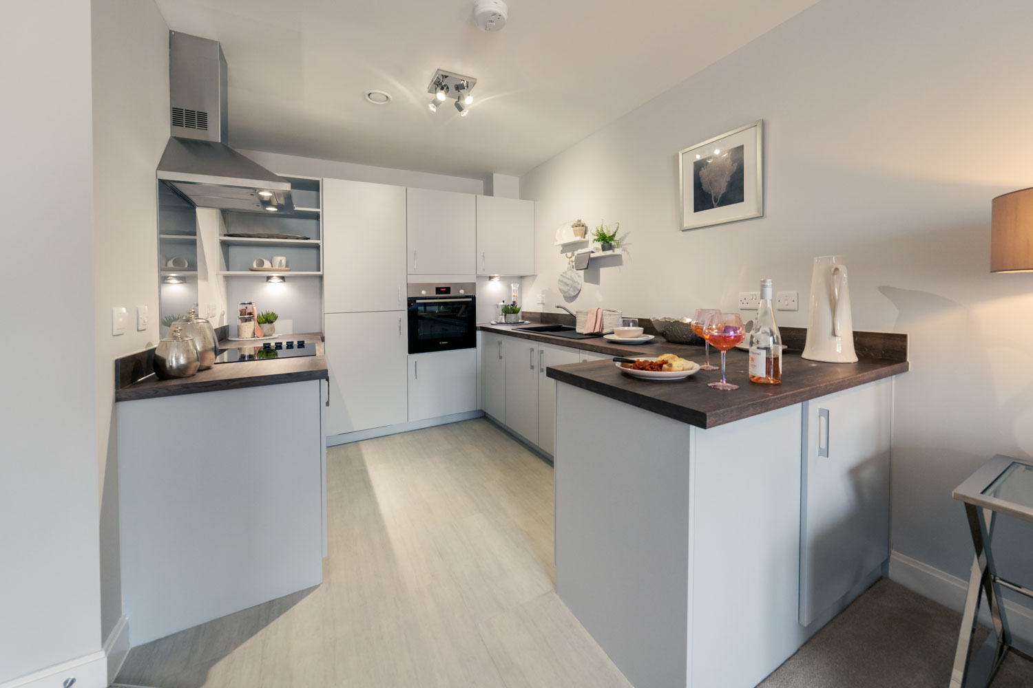 a kitchen with white cabinets