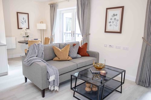 a living room with a couch and coffee table