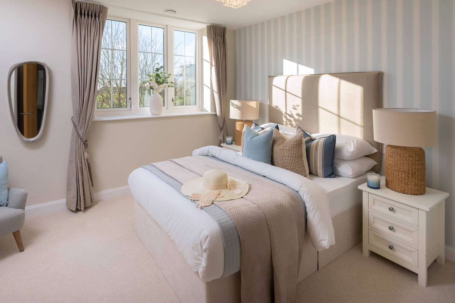 a bedroom with a bed and a mirror