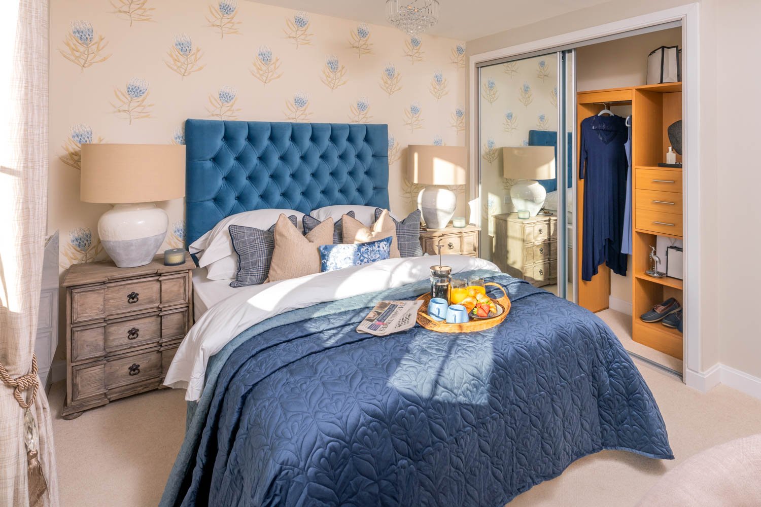 a bedroom with a bed and dresser