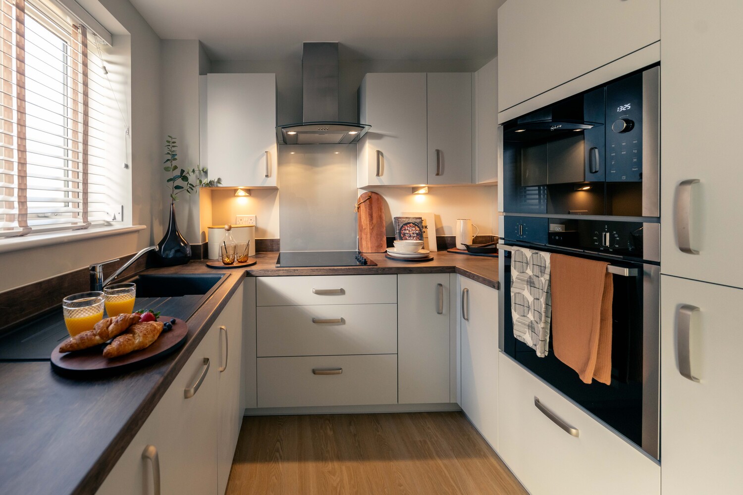 a kitchen with a stove and oven