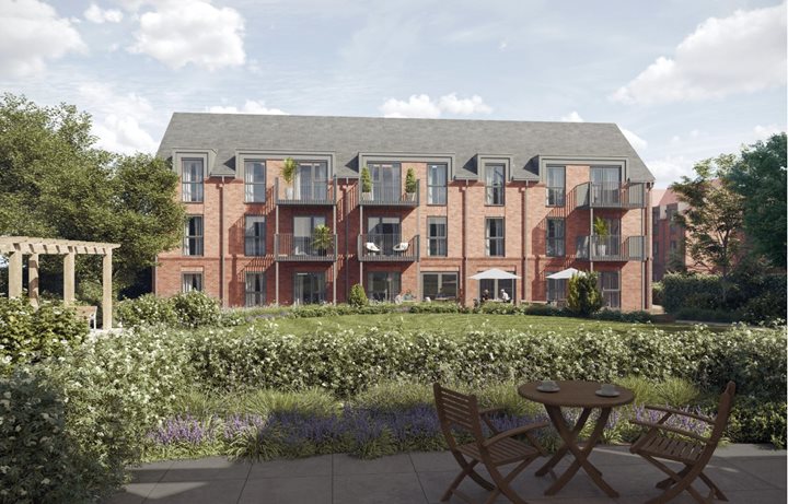 a brick building with a table and chairs in front of it