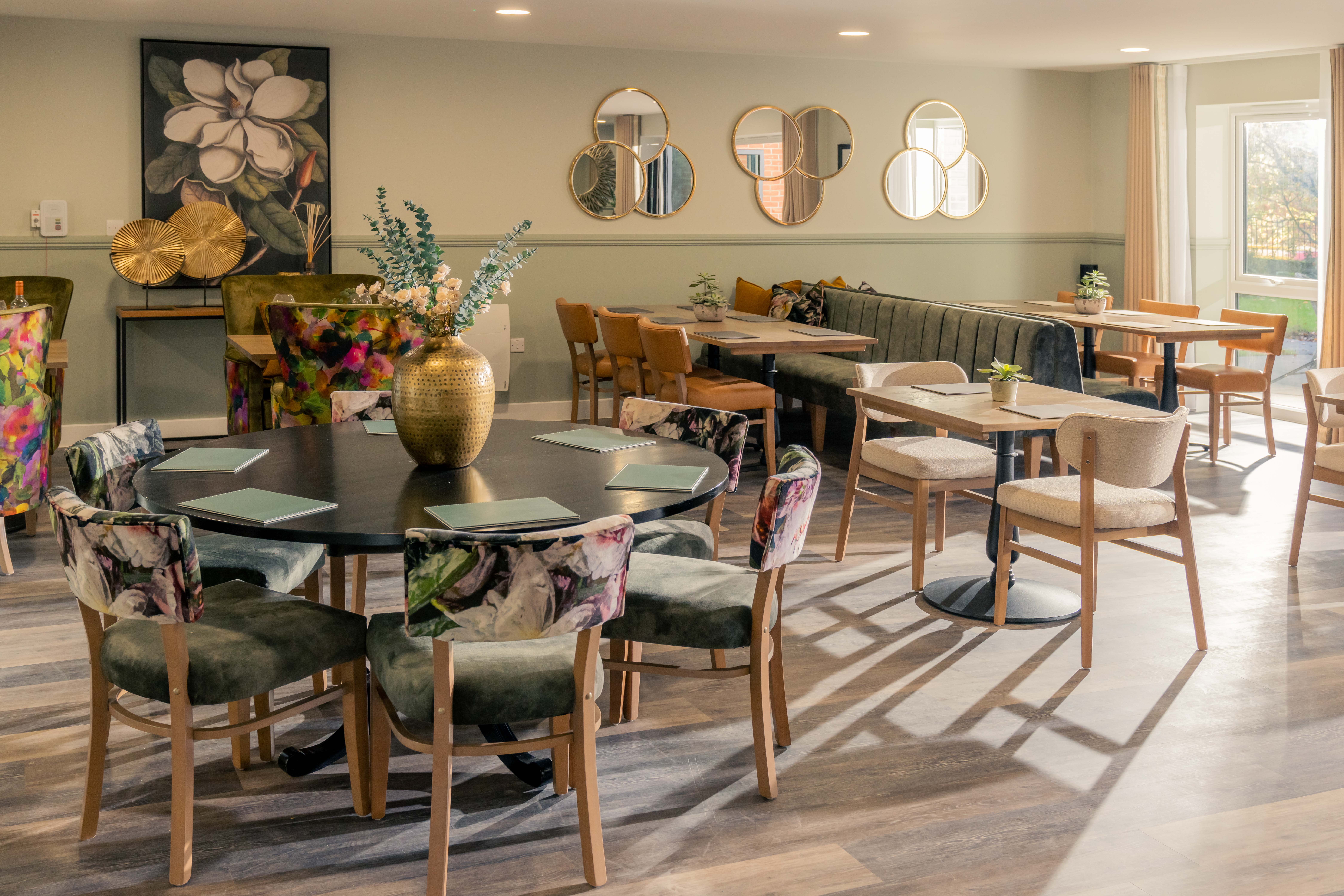 a room with tables and chairs
