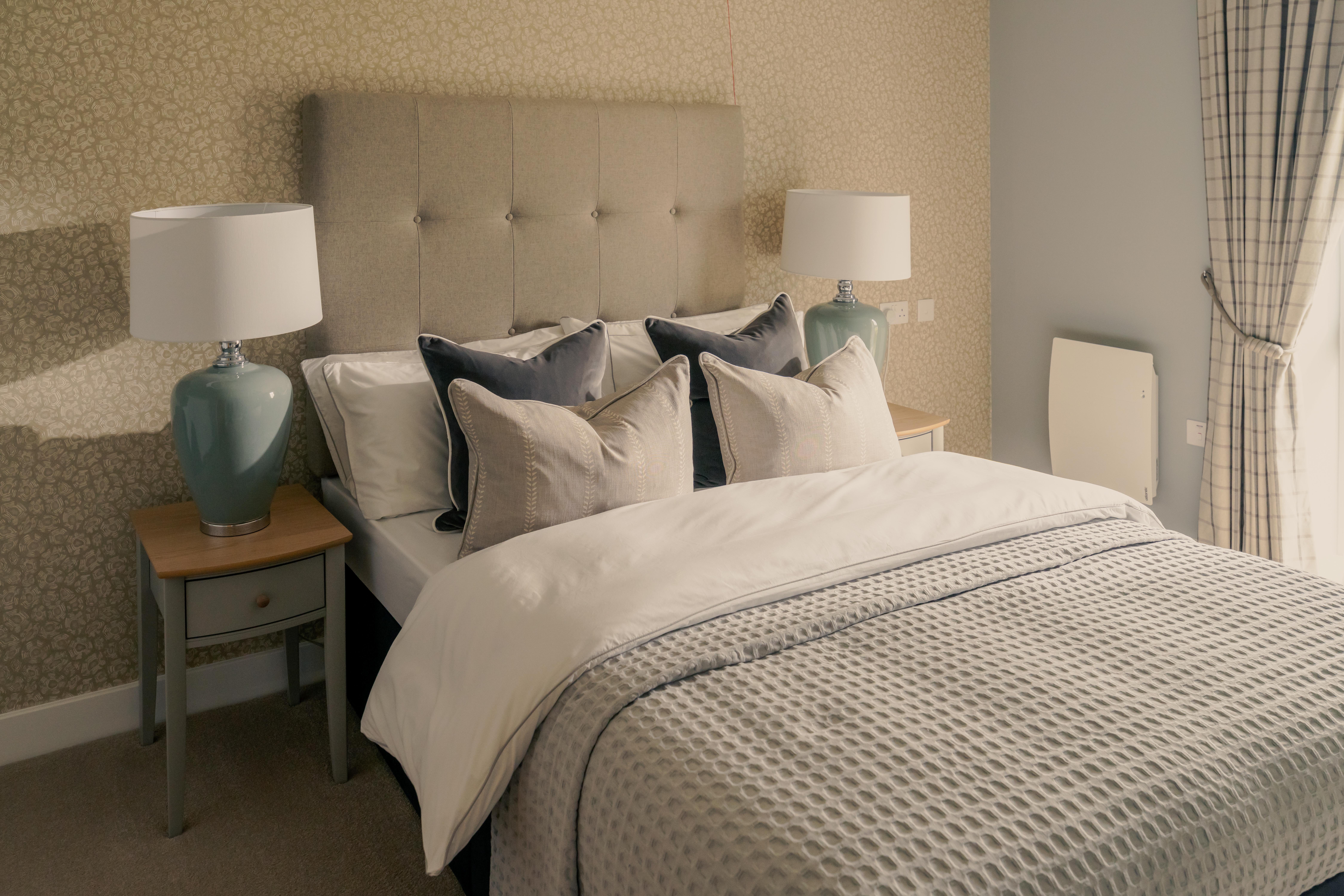 a bed with white sheets