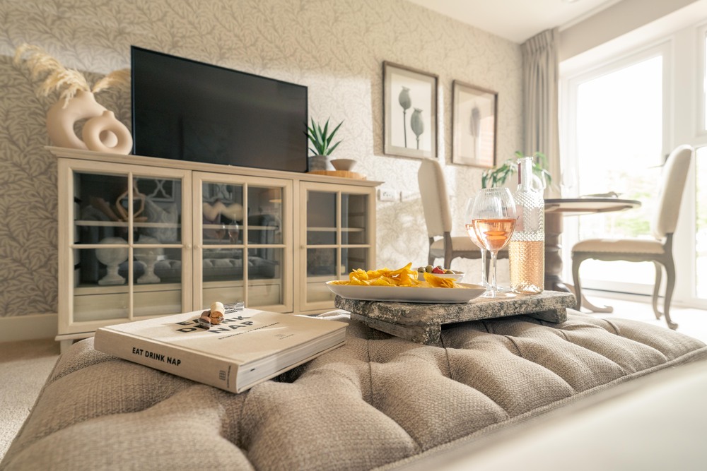 a living room with a tv and a couch